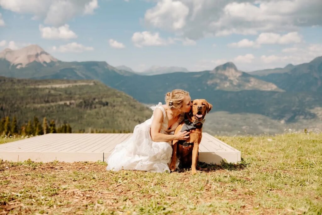 Couple and their dog on a Colorado mountainside
